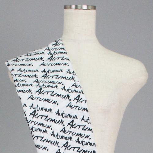 C0149　白黒ロゴ模様柄生地