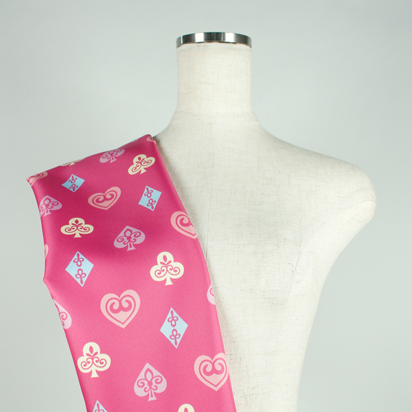 C0610　ピンクベースカラフルスート柄生地