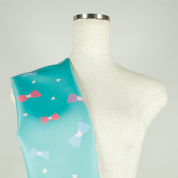 C0615　ミントベースカラフルハートリボン柄生地